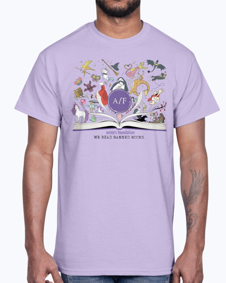 Annie’s Foundation ‘We Read Banned Books’ design on orchid t-shirt; whimsical art inspired by beloved banned books.
