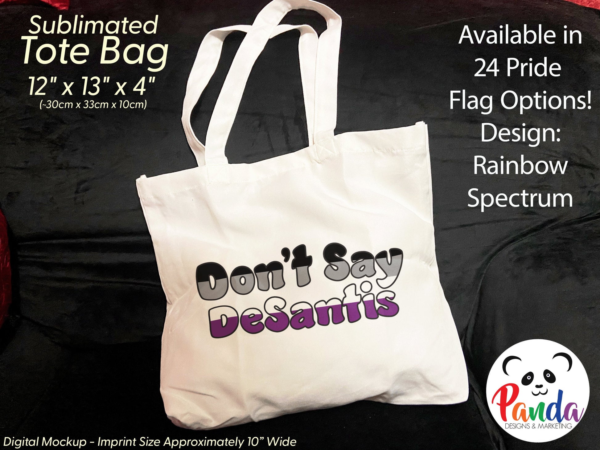 Photo of a white tote bag on a black velvet count. The back has "Don't Say DeSantis" in asexual  pride flag colors with black outline of fun shaped text